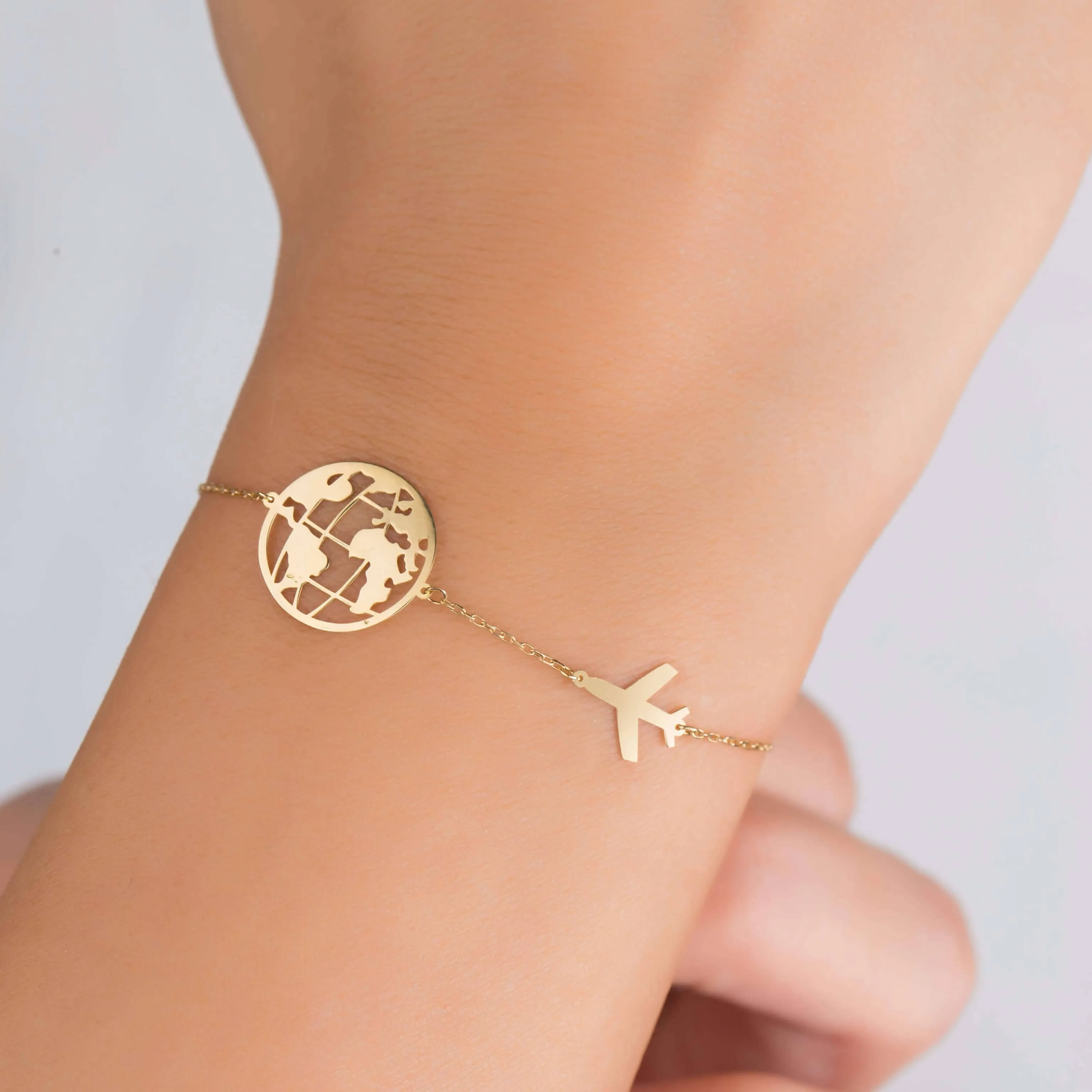 18K Gold Plane And Globe Bracelet - Garo Boyadjian