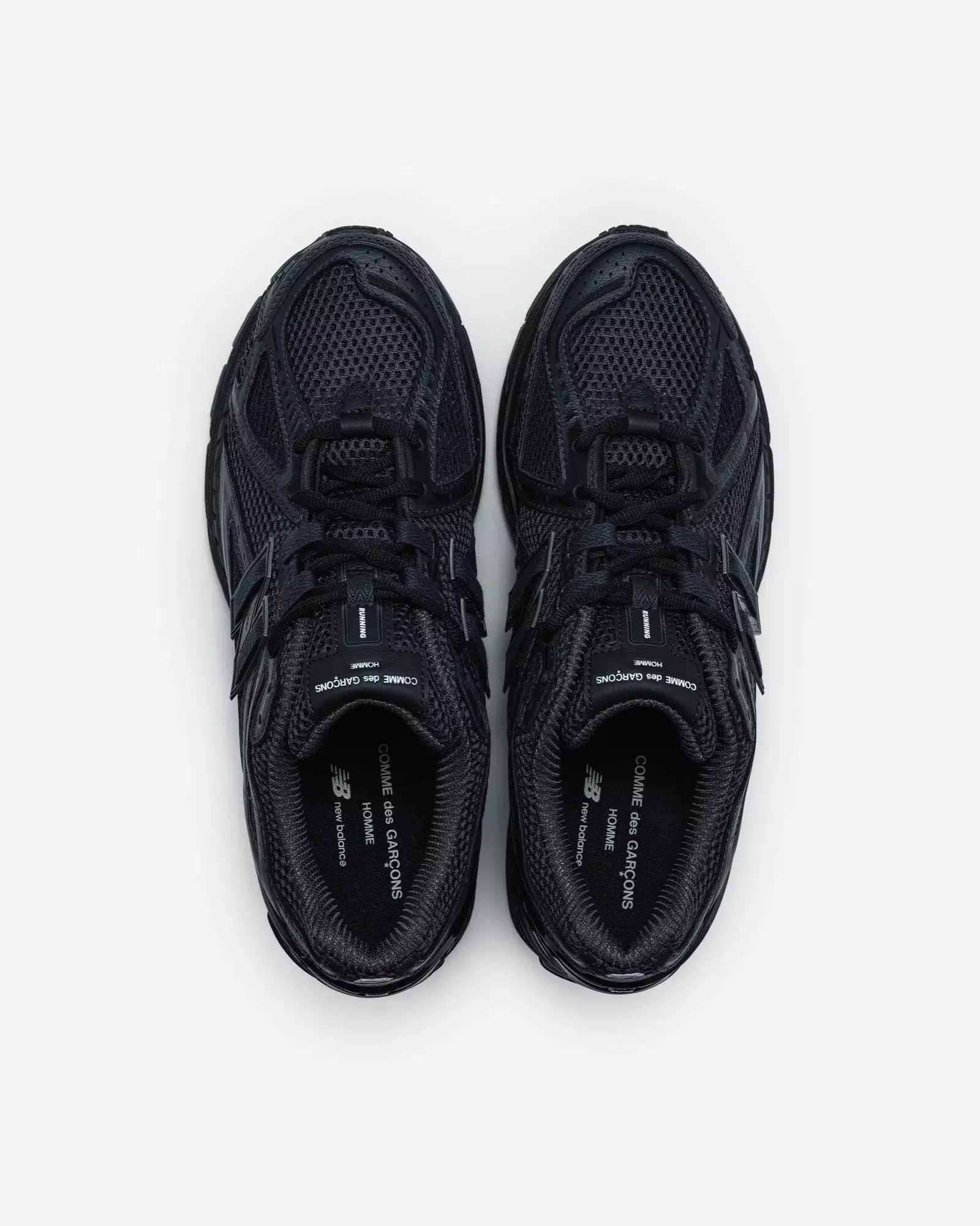 CDG x New Balance in Black/Black